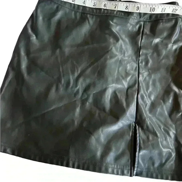 Shein black faux leather mini skirt with from slit and back zip.‎ EUC. - Picture 3 of 8